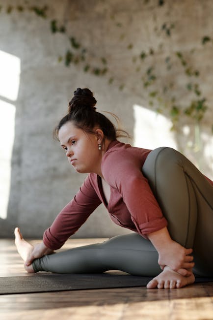 Woman performing a calm yoga pose in a modern room with purple accents